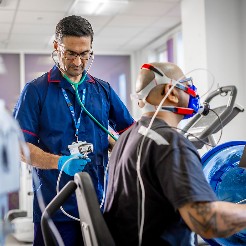 NHS doctor supporting patient